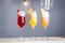 Colorful Summer Cocktails with Prosecco, Three Kind of Fruit Cocktails - Raspberry, Peach and Pineapple, Horizontal Wallpaper