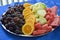 Colorful summer fruit platter watermelon, melon, orange slices and red grape