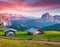 Colorful summer sunrise on the Sassolungo Langkofel and Sella