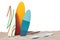 Colorful Summer Surfboards on the Sand Sunny Beach. 3d Rendering