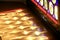 Colorful sunlit stained glass coloring wood in Catholic religious monastery