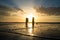 Colorful Sunrise at the Ocean with Waves Gently Rolling onto the Beach