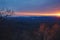 Colorful sunrise over layered mountains in Blowing Rock, North Carolina.