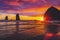 Colorful Sunset Dancing Sun Haystack Rock Sea Stacks Canon Beach Oregon