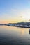 Colorful sunset in the harbor of city of Drama, Greece with boats