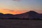 Colorful sunset over the Namib desert, Namibia, Africa. Scenic sand dunes in backlight in the Namib Naukluft National Park, Swakop