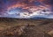 Colorful sunset over the rocky steppe.