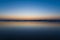 Colorful sunset reflected in a wet sandy beach