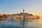 Colorful sunset of Rovinj town, Croatian fishing port on the west coast of the Istrian peninsula.