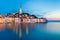 Colorful sunset of Rovinj town, Croatian fishing port on the west coast of the Istrian peninsula.