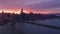 Colorful sunset sky above San Francisco financial district buildings, Bay Bridge