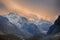 Colorful sunset sky, clouds and mountains in high valley. Huge