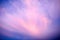 Colorful sunset sky with pink clouds