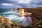 Colorful sunset views of a deserted beach and rock formations Twelve Apostles Sea Rocks near Great Ocean Road, Port Campbell