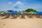 Colorful sunshade and chairs on beach in Phuket