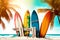 colorful surfboards standing in tropical beach sand with ocean in the background