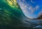Colorful Surfing Wave Lit with sunlight in Pacific Ocean in Maui