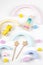 Colorful sustainable zero waste educational toys for baby kids on white background. Top view, flat lay
