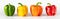 Colorful sweet peppers on a white background. Banner. Set with green, yellow, orange and red bell peppers. Pepper closeup