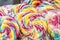 Colorful sweet spiral lollipops in the shop