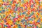 colorful sweet sprinkles like background, festive conc
