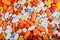 Colorful tablets, pills and drugs background.