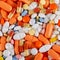 Colorful tablets, pills and drugs background.