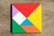 Colorful tangram puzzle in square shape