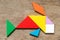 Colorful tangram puzzle in swimming fish or carp shape