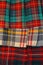 Colorful tartan plaid kilts in vertical image