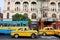 Colorful taxi cabs drive faster of real speed limit
