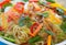 Colorful Thai rice noodles in dish ready to serve