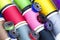 Colorful thread bobbins close-up