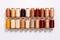 Colorful Thread Spools in Closeup Shot, Showcasing Multi-Color Bobbins on White Background, Generative AI