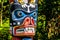 The colorful `Thunderbird House Post Totem Pole` . The pole is loc