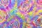 Colorful tie dye swirl background. Trendy spiral Fashion Dirty Paint. Tie Dye Striped Design. Rainbow Artistic Circle