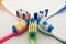 Colorful toothbrushes on white background with copy space. Macro