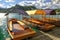 Colorful tourist boats on a lake