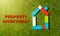 Colorful toy blocks house and text Property investment written on grass in housing market business