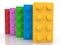 Colorful toy bricks in one row behind each other