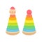 Colorful toy pyramids with clown heads in red funny hat. Cute toy clowns smiling.Classic ring stacker with a fun design