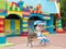 Colorful toy town building with coloful blocks and a boy cartoon