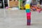 Colorful toys and disorder on floor at home. Tower of soft rubber cubes. Children development and hapy chilldhood concept