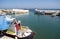 Colorful traditional fishing boats at harbor on the secluded Greek island of Kasos