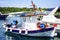 Colorful traditional Greek fishing boats in port of Lixouri town