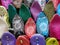 Colorful traditional slippers or shoes at a Moroccan bazaar in Marrakech.