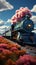 Colorful train glides through a hot, cloudy summer afternoon