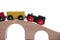 Colorful train toy on wooden bridge with white background