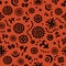 Colorful tribal seamless pattern. Black on orange. Texture with African symbols.