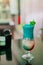 Colorful tropical coctail on the bar counter in the hotel. Resort